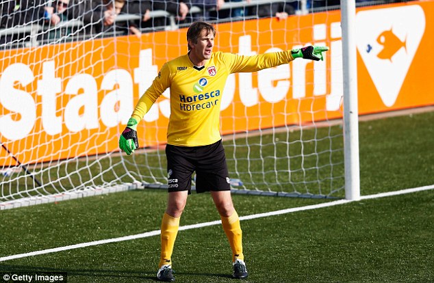 Van der Sar saves penalty as he makes comeback for former club at 45 Van der Sar saves penalty as he makes comeback for former club at 45