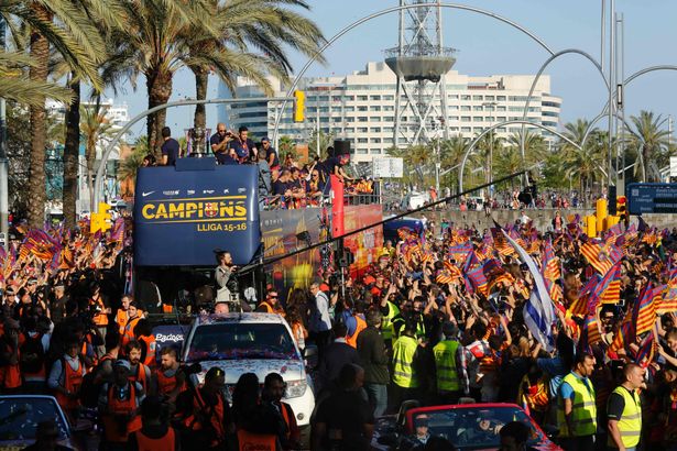 PICTURES: Messi, Suarez and Co parade through the Catalan capital as Barca celebrate La Liga title win PICTURES: Messi, Suarez and Co parade through the Catalan capital as Barca celebrate La Liga title win