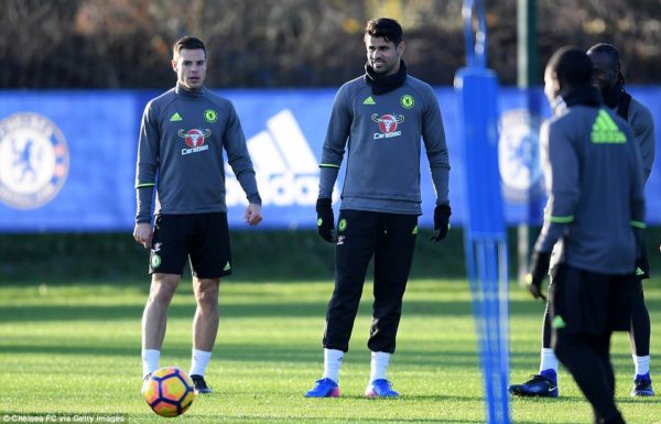 Diego Costa and Conte make peace as striker returns to training with Chelsea teammates Diego Costa and Conte make peace as striker returns to training with Chelsea teammates
