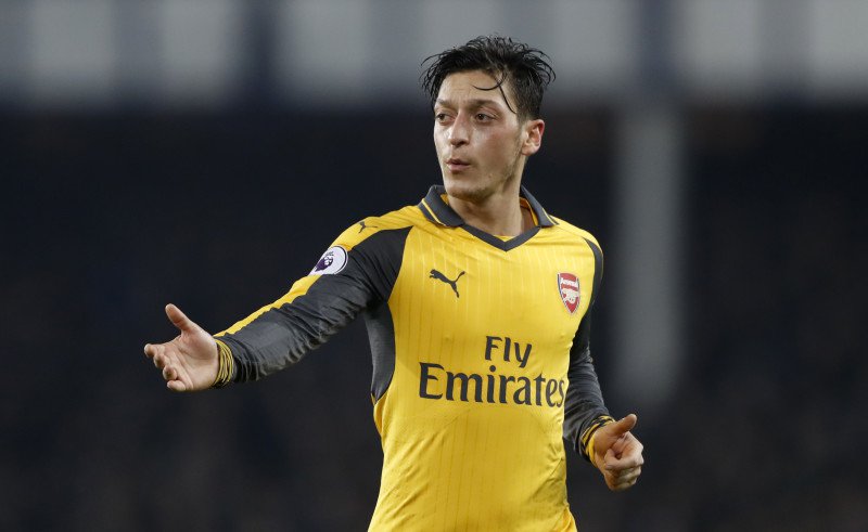 Ozil hits back at Henry over his Arsenal contract dilemma Ozil hits back at Henry over his Arsenal contract dilemma