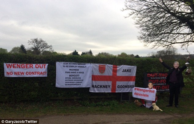 Arsenal fans protest against Wenger at the club’s training ground Arsenal fans protest against Wenger at the club’s training ground