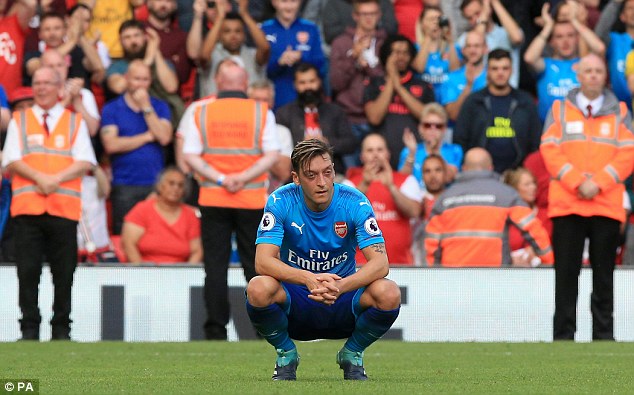 Ozil apologises for Arsenal hammering Ozil apologises for Arsenal hammering
