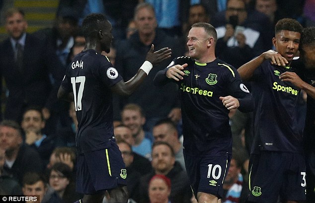 Rooney taunts angry Man City fans after scoring for Everton Rooney taunts angry Man City fans after scoring for Everton