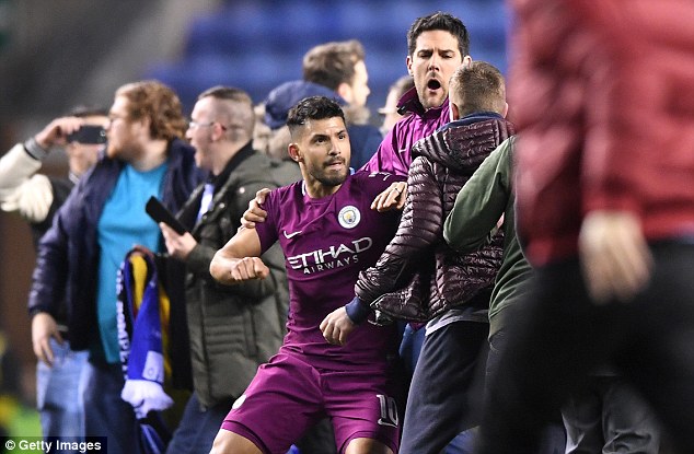 Man City claim Wigan pitch invader told Aguero to ‘suck my d***’ and spat at him Man City claim Wigan pitch invader told Aguero to ‘suck my d***’ and spat at him