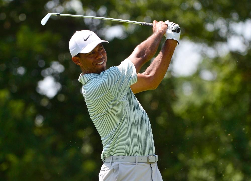 Woods shares Zozo lead after strong start Woods shares Zozo lead after strong start