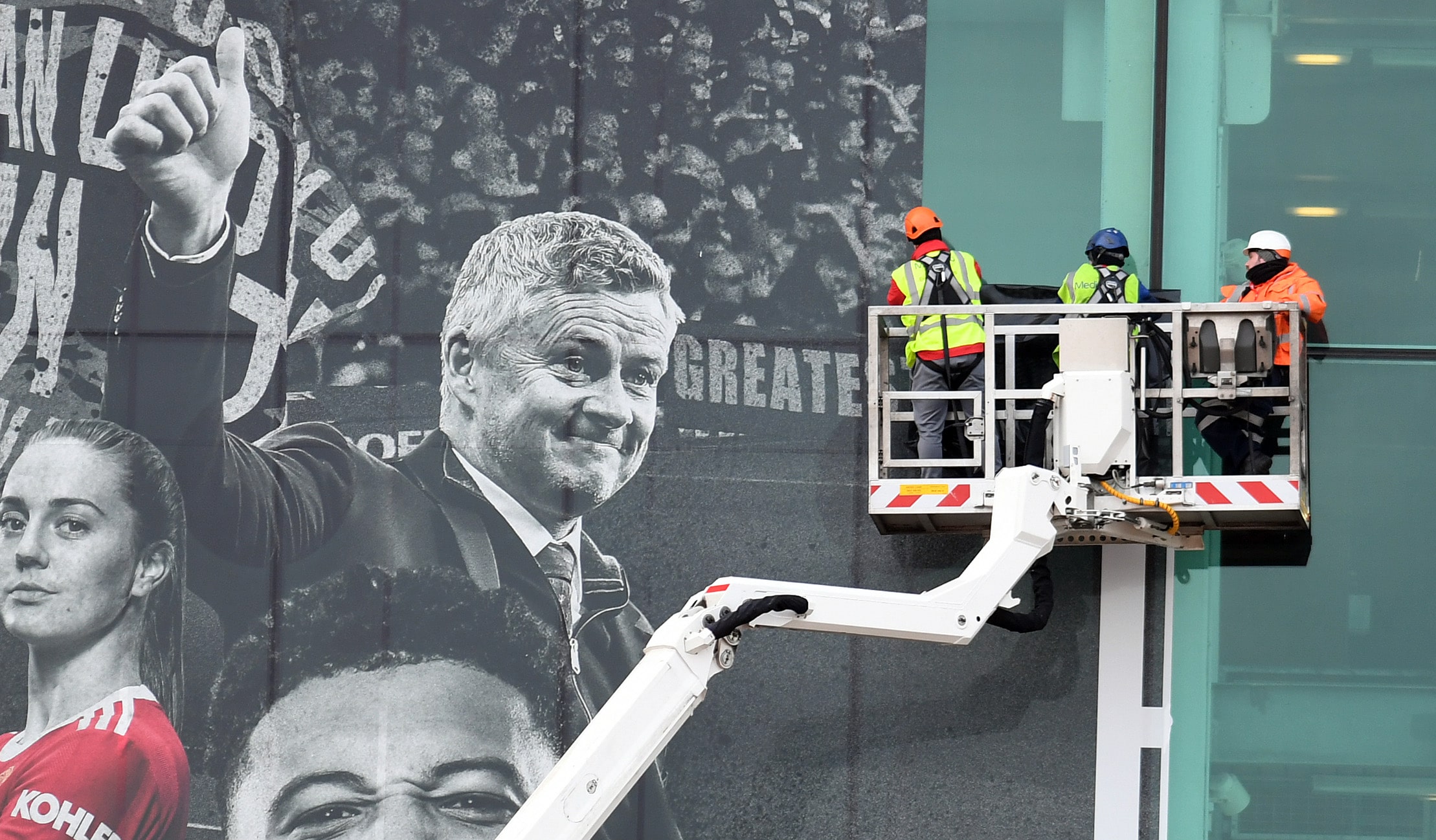 Man United Tear Down Solskjaer Posters Outside Old Trafford After Sacking Man United Tear Down Solskjaer Posters Outside Old Trafford After Sacking